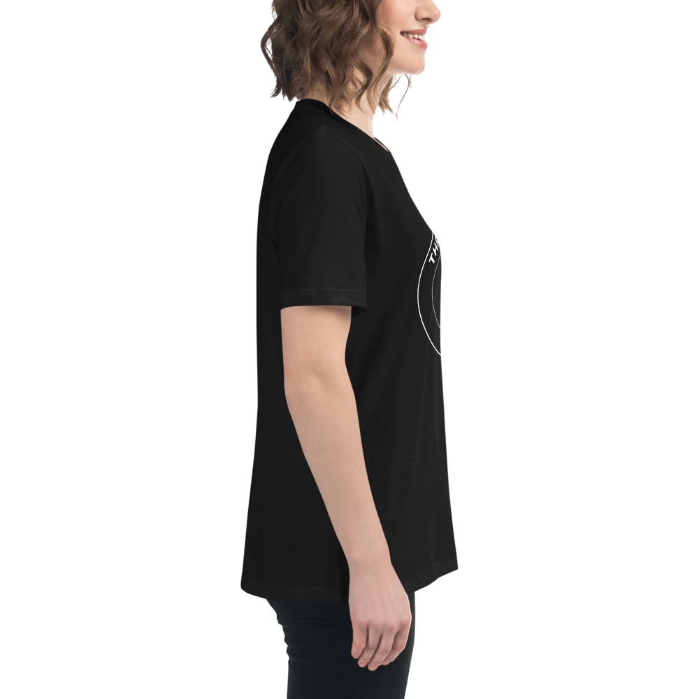 a woman wearing a black shirt and black pants