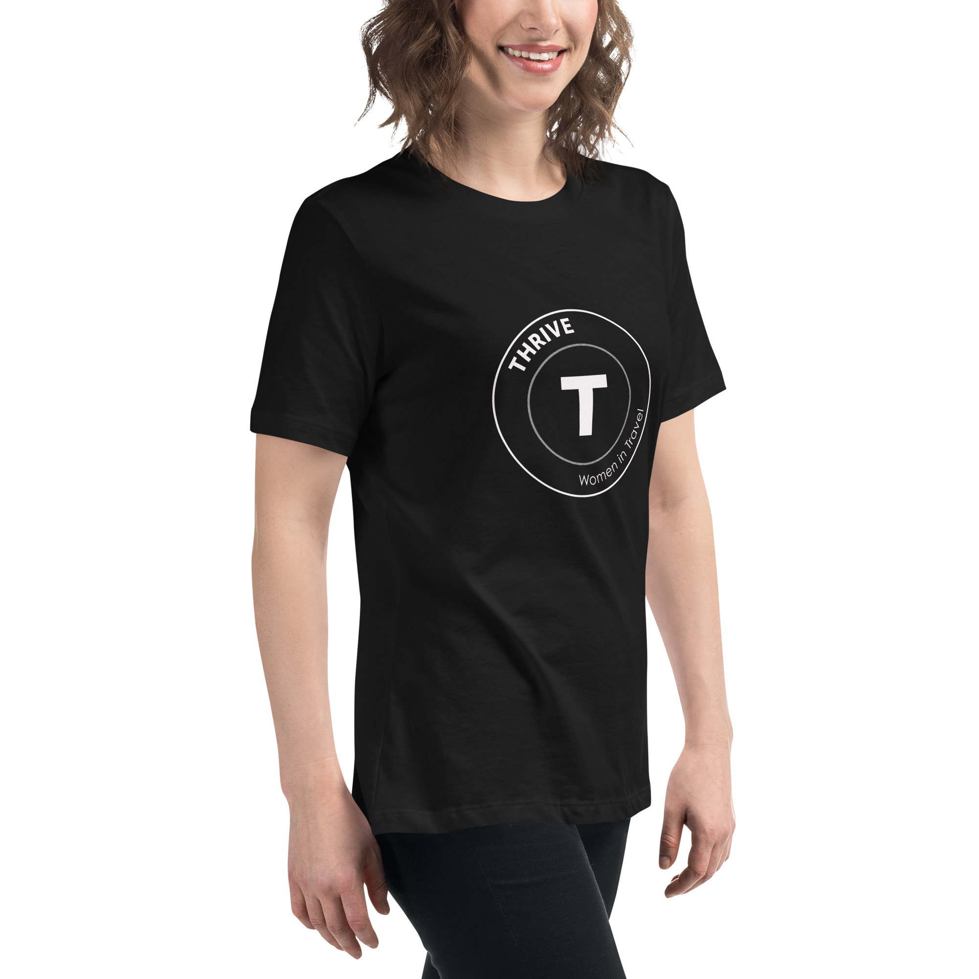 a woman wearing a black t - shirt with a white t on it