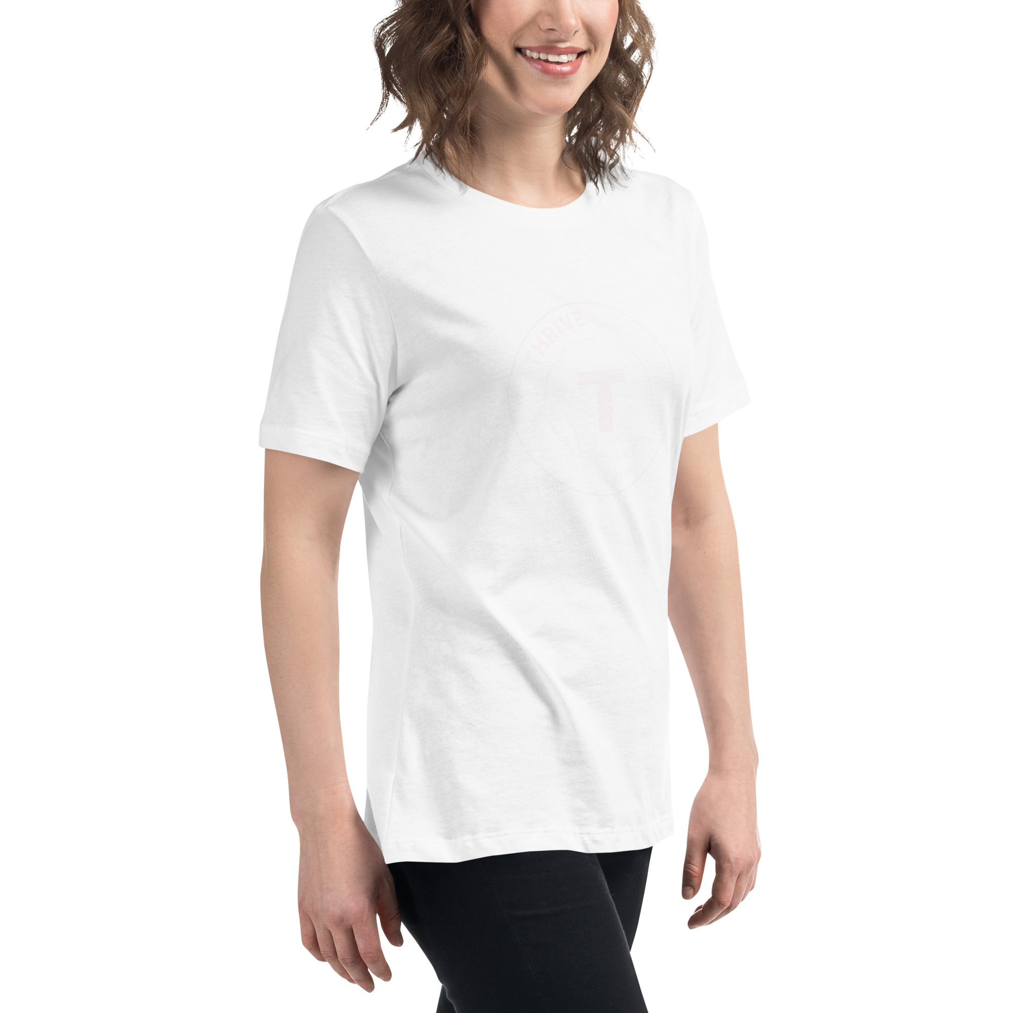 a woman wearing a white t - shirt and black pants